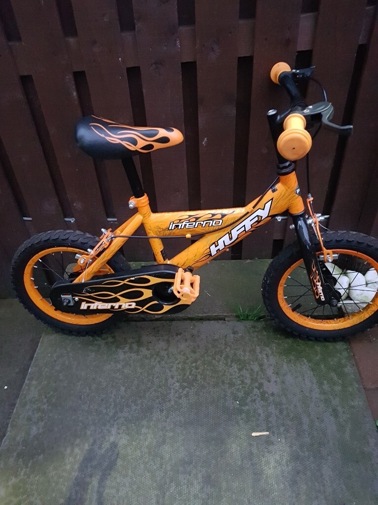 huffy 14 inch bike orange